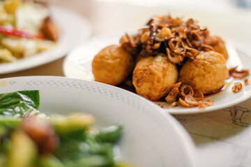 Boiled Eggs and bring to fried seasoned  in the plate for breakfast or lunch or diner