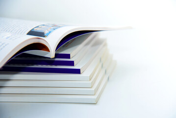 stack of books on white
