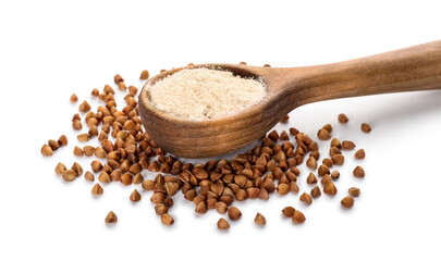Spoon with flour and buckwheat grains on white background