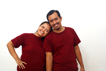 Obraz premium Happy Asian couple standing while looking at camera. Isolated on white background with copyspace