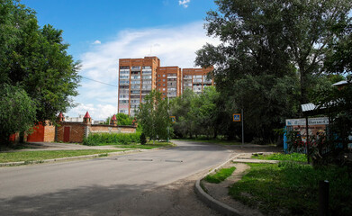 One of the city streets. Views of Ust-Kamenogorsk (kazakhstan). Soviet apartment buildings. Summer
