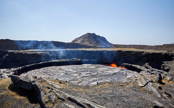 The largest lava lake in the Erta Ale caldera and the summit of Mount Erta Ale, Danakil Depression, Ethiopia