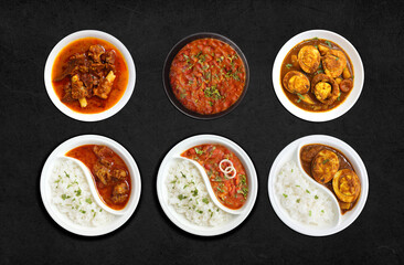 Assorted Indian Rice and curry dishes in one banner. Dal rice, Egg curry, Rajma chawal and mutton curry. Dark moody food banner for website or restaurant menu. Copy space.
