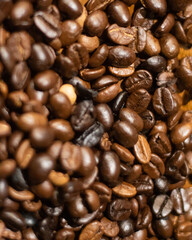 A close up picture of coffee beans in plate, picture is clicked by selected focus 