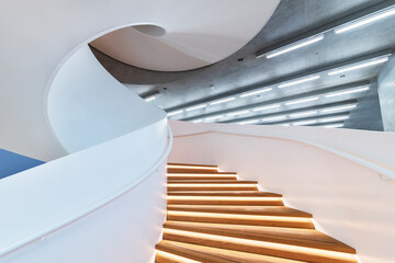 Interior view of modern spiral staircase. Contemporary architecture abstract background