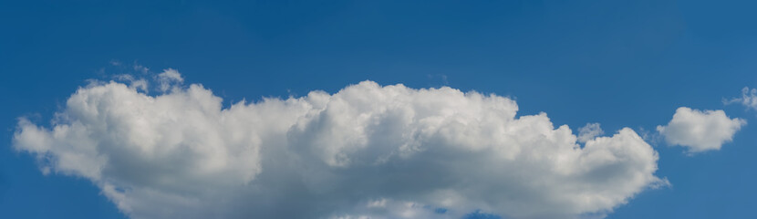 Big white cloud in the blue sky.