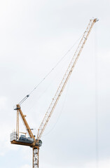 Fototapeta premium Tower construction crane with white background
