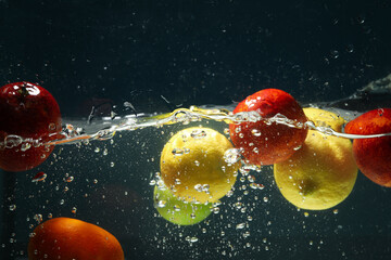 Concept of fresh summer fruits, fruits in water