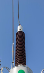 Ceramic insulator for industrial transformer. Close-up. selective focus