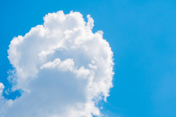 Background with closeup of white cumulus cloud