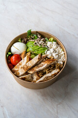 Healthy Protein Food Bowl with Chicken, Avocado, Egg, Cheese and Greens Salad for Athlete Fitness Sports