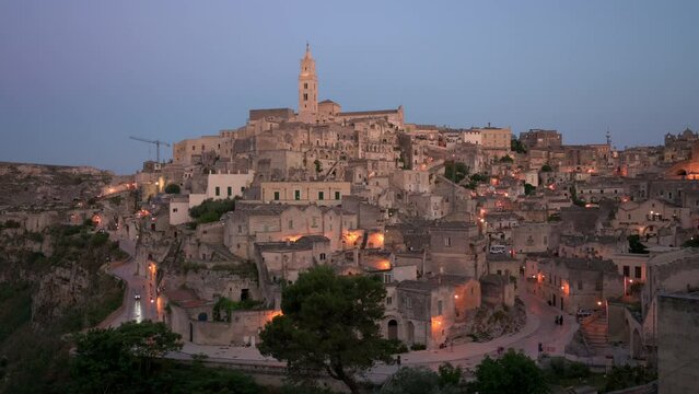 Stunning view of the Matera&rsquo;s skyline during a beautiful sunset. Matera is a city on a rocky outcrop in the region of Basilicata, in southern Italy.