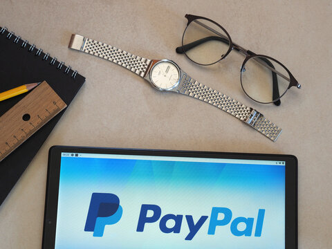 In this photo illustration PayPal Holdings, Inc. logo seen displayed on a tablet