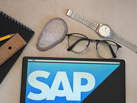 In this photo illustration SAP SE logo seen displayed on a tablet
