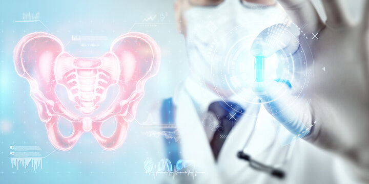 Doctor and Hologram, anterior ultrasound image of the male pelvis, sacrum. Anatomy, medicine, scientific concepts.