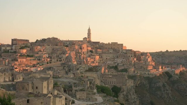 Stunning view of the Matera&rsquo;s skyline during a beautiful sunrise. Matera is a city on a rocky outcrop in the region of Basilicata, in southern Italy.