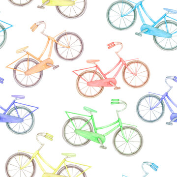 Seamless drawing with watercolor bicycles of different colors chaotically arranged on a white background. Hand-drawn.