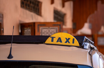A taxi cab in the city