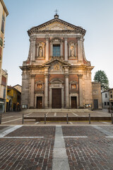 Obraz premium Italian church. Historic center of Somma Lombardo (Sum Lombard), Lombardy, Italy. Square Vittorio Veneto and the Basilica of Sant'Agnese (1665 AD) in the early morning