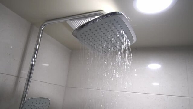 People swim in pool underwater. Underwater photography of people or children on vacation in shallows in pool. Holiday weekend. Rest in water. Swimming and diving in water.