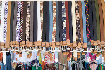 Belts at a street market stall