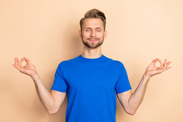 Fototapeta premium Photo of young man dream relax meditate fresh energy concentrated isolated over beige color background