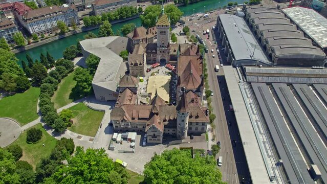 Aerial view of Swiss National Museum, main railway station, River Limmat, the old town and Lake Z&uuml;rich at City of Z&uuml;rich on a sunny summer day. Movie shot June 20th, 2022, Zurich, Switzerland.