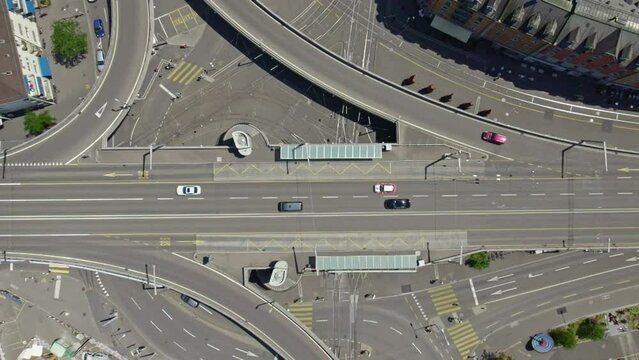 Aerial view of Escher Wyss Square with highway junctions and bus station at industrial district of City of Z&uuml;rich on a sunny summer day. Slow motion movie shot June 20th, 2022, Zurich, Switzerland.