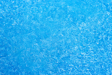 Beautiful blue water surface with tiny waves and ripples.