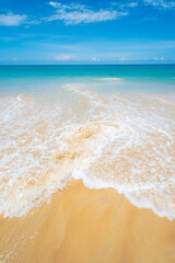 Amazing tropical beach sea water wave on sand beach in sunny day Location Phuket Thailand on may 2022