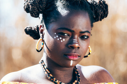African woman in bright traditional dress