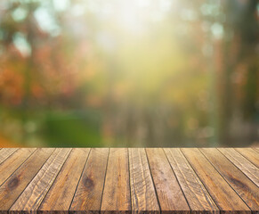 Empty wooden table background in the daytime. blurry view. suitable for your product display