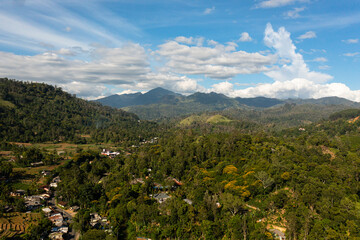 Aerial drone of Ella town among mountains and tea plantations. Sri Lanka.