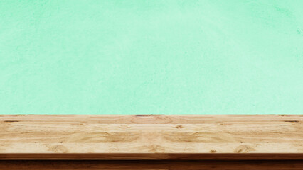 Empty wooden table with green wall background. Kitchen mock up for design.