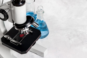 Research in medical laboratory with microscope equipment, close up
