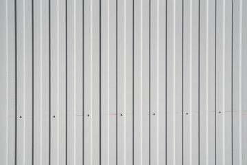 The texture of a metal white gray profile
