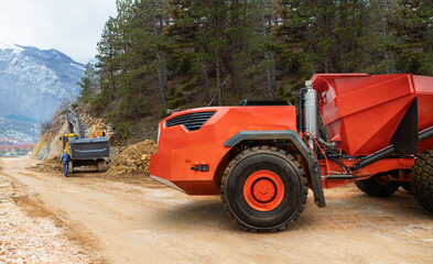 Autonomous self-driving truck on mountain road construction	
