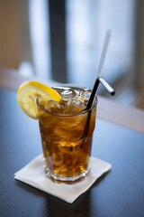 Whiskey cocktail with lots of ice served in a glass