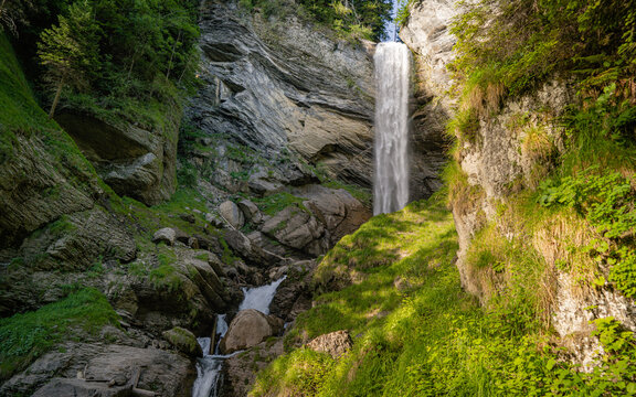 Waterfall in the mountains, Berschnerfall during sunset, Flums, Switzerland