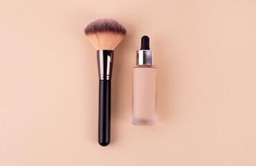 Liquid foundation cream unbranded bottle with makeup brush. Facial correction, liquid concealer,...
