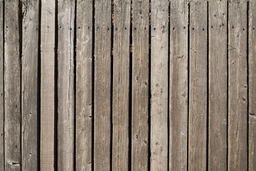 Old rough wooden desks with nails