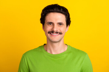 Portrait of satisfied glad young person toothy beaming smile look camera isolated on yellow color background