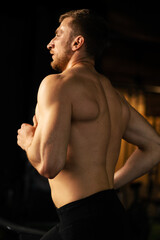 Fototapeta na wymiar Male athlete running on a treadmill