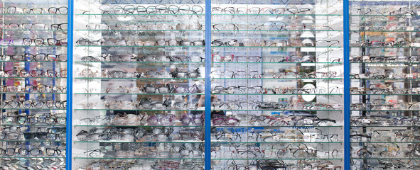 Sunglasses on optics shelves. Large selection of glasses for vision correction. The glasses are...