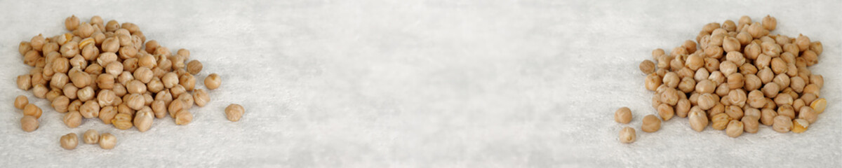 Dry chickpea peas banner with copy space on bright background..