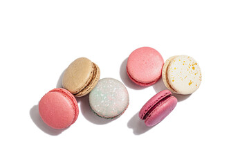 Different colorful French macarons isolated on white background. Culinary and cooking concept