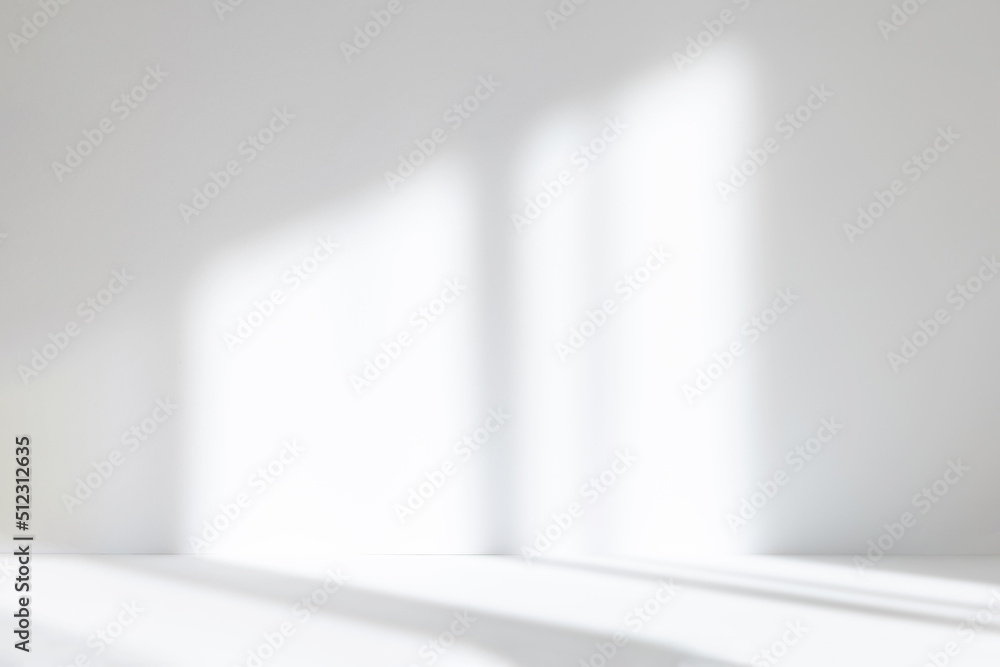 Poster Abstract white studio background for product presentation. Empty room with shadows of window. Display product with blurred backdrop.
