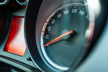 Modern car speedometer,odometer,tachometer and illuminated dashboard. car dashboard modern automobile controlilluminated panel speed display.Car instrument panel.Close up.Selective focus.
