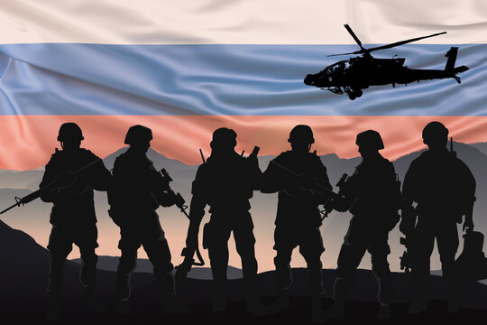 Silhouettes of soldiers with Russian flag background