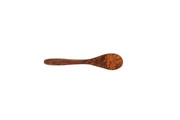 Aguaje flour in wooden spoon on white background. Aguahe powder. Dried and pulverized pulp of aguaje can relieve menstrual discomforts